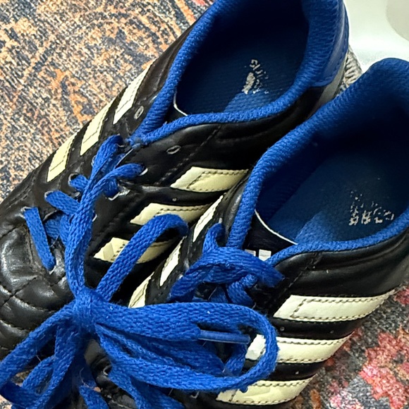 Adidas Black Cleats with Blue Highlights - Picture 2 of 3